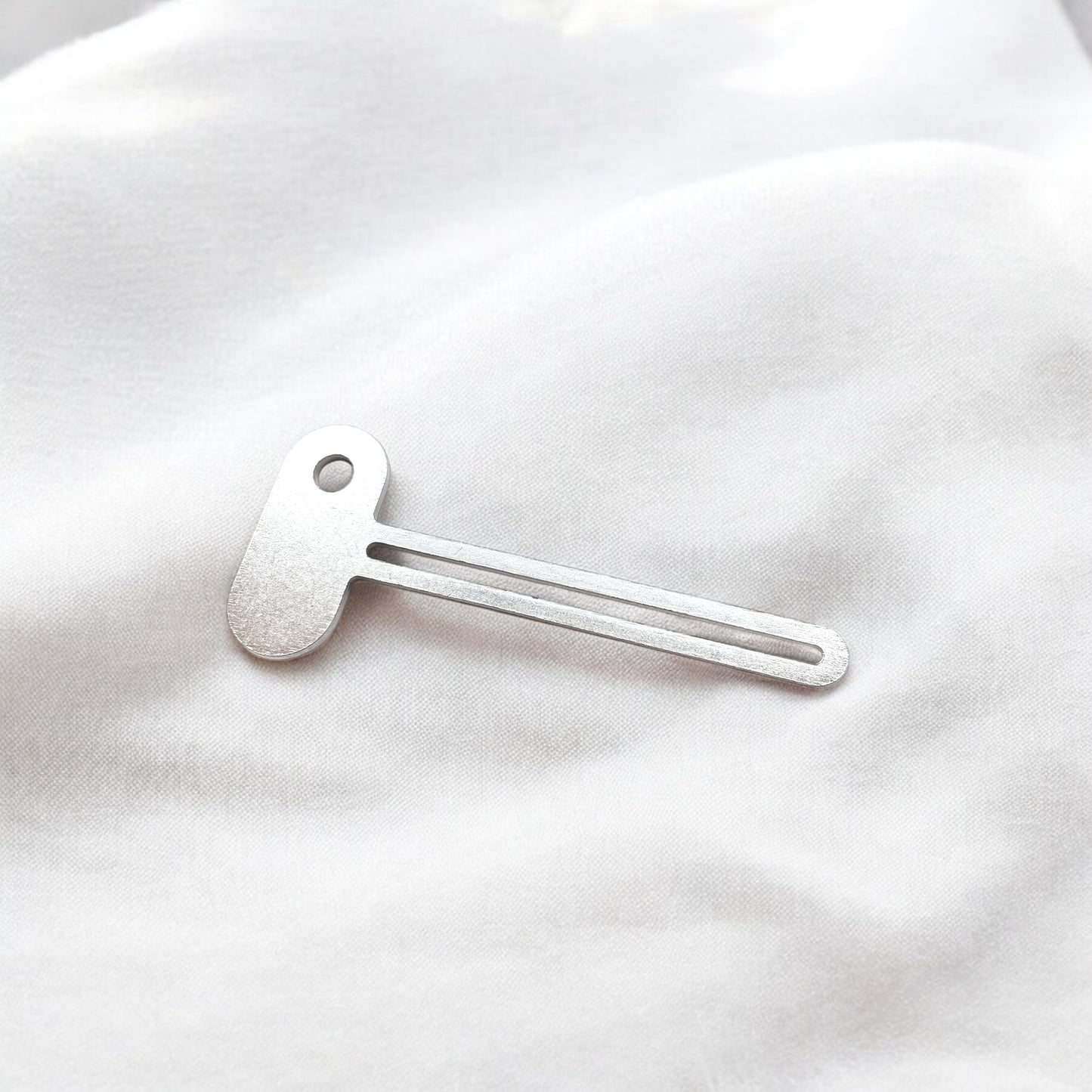 Metal paint-tube squeeze key - re-usable